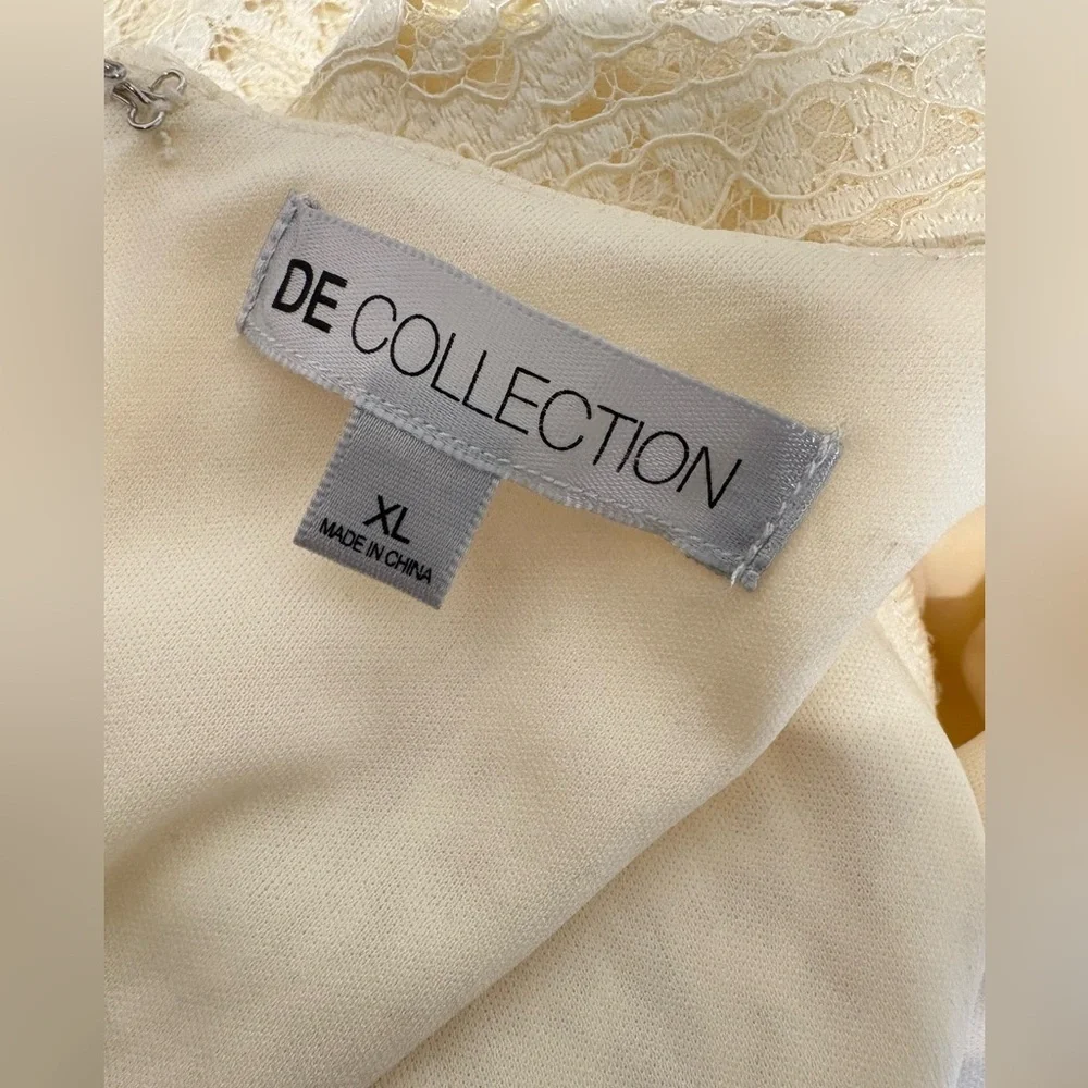 Cream/pale yellow - lace dress from the brand De Collection. Size XL